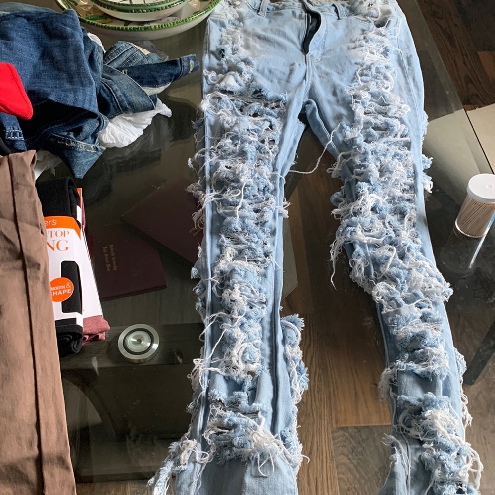 Ripped jeans very ripped if you like looking sexy with a little under butt.